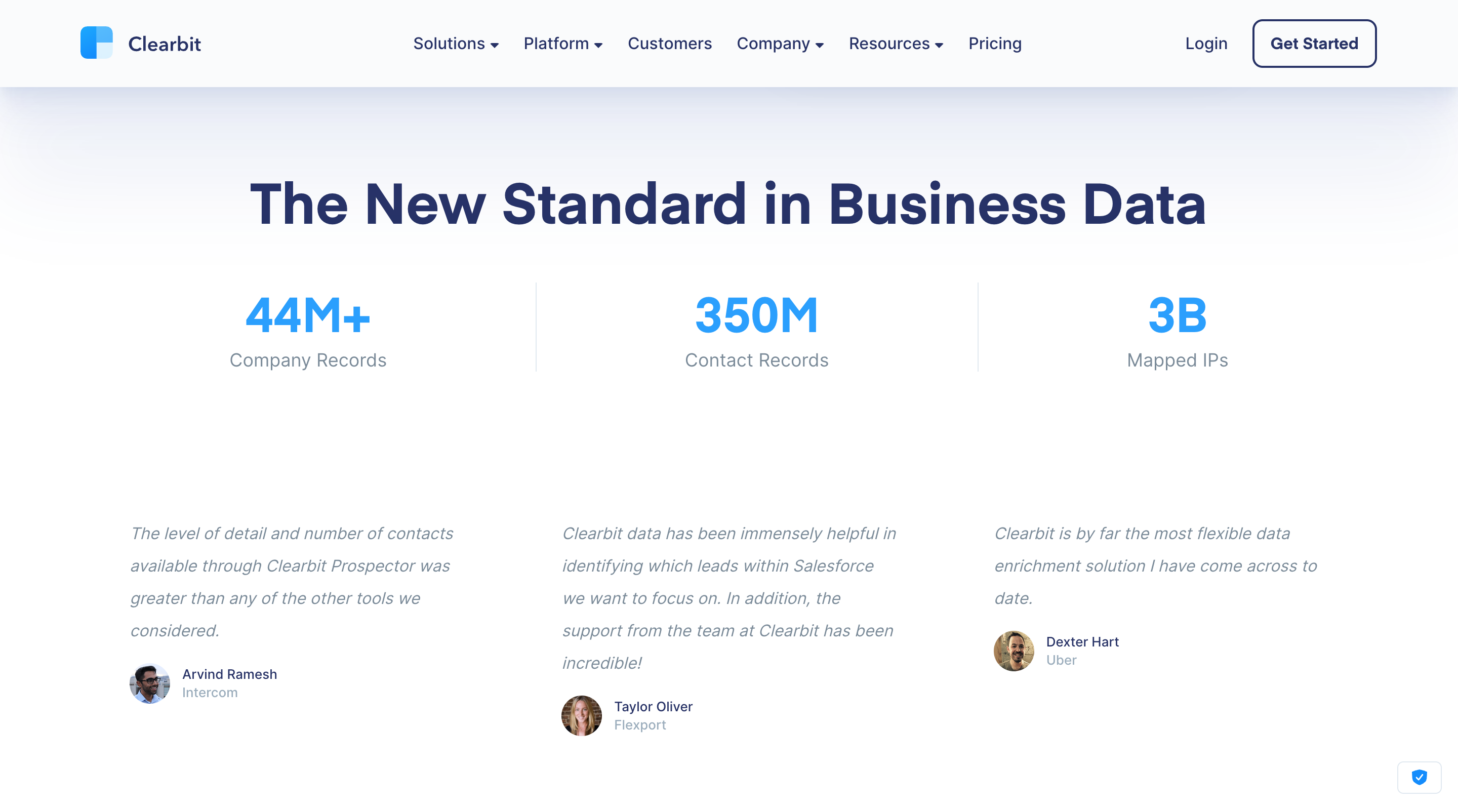 Screenshot of the 'The New Standard in Business Data' section of the Clearbit website. The section contains testimonials from three Clearbit users arranged in three columns.